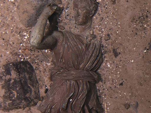 Titanic divers find long-sought statue amid signs of accelerating ship decay