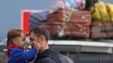 Dozens of Karabakh children reach safety in Armenia in back of a truck