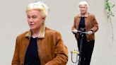 Deborra-Lee Furness smiles as she zips around New York on a scooter