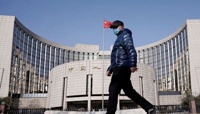 Chinese money flows into bonds even as central bank warns of risks