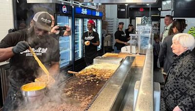 U.S. Treasury Secretary Janet Yellen orders a 'Wiz Wit' cheesesteak sandwich at Jim's South St. sandwich shop after an event with Pennsylvania's Governor...