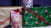 Need last-minute gifts? Presidential hopefuls offer ornaments, gift wrap — and Trump mug shot merch