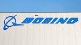 Boeing posts lower first quarter loss, beating estimates