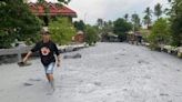 Torrent of volcanic mudflow hits Philippine village | FOX 28 Spokane