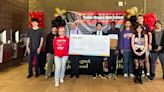 Amazon gives $10,000 to Caddo Magnet High class