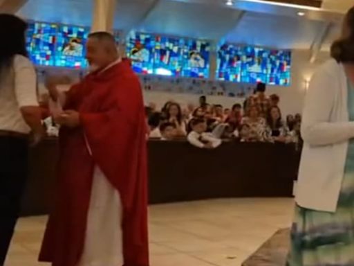 Priest bites woman at Mass after denying her communion, police say