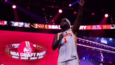 Rappers Jeezy and 2 Chainz celebrate with Hawks fans at draft watch party