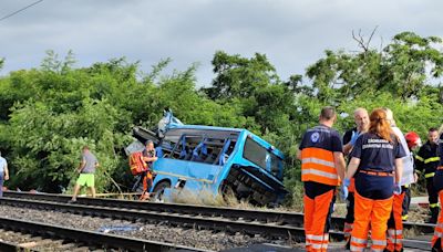 At least seven dead as train collides with bus in Slovakia