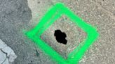 Mysterious hole emerges on East Liberty and Thompson Street in Ann Arbor