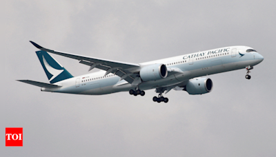 Cathay Pacific bans two passengers as seat-reclining dispute turns 'xenophobic' - Times of India