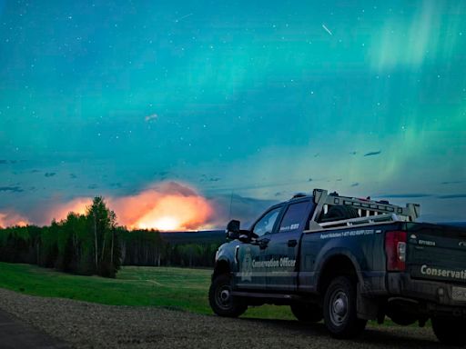 Town prepares for possible 'last stand' as wildfires rage in western Canada