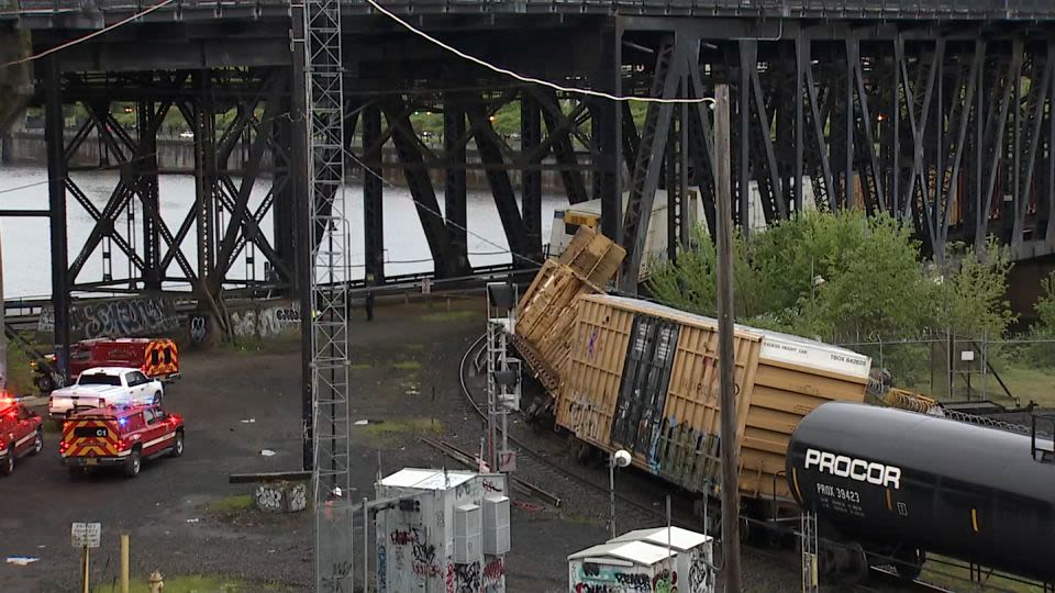 A train derailment shuts down a historic bridge that carries cars and trains in Portland, Oregon