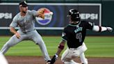 White Sox score tying run after intentional balk, beat Diamondbacks 9-2 for rare road win