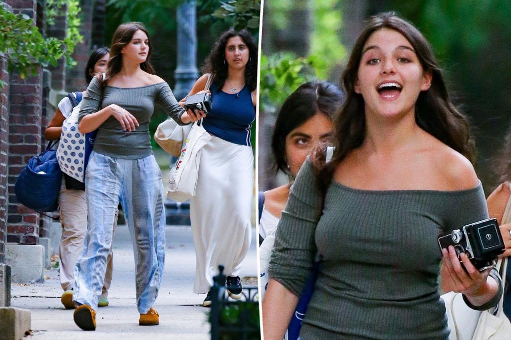 Suri Cruise, 18, looks just like mom Katie Holmes in off-the-shoulder blouse while out with friends in NYC
