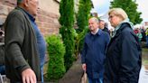 Scholz sticks on his wellies to inspect damage caused by flash floods and landslides