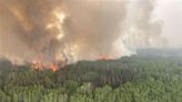 Canadian PM Trudeau visits Alberta as wildfires rage