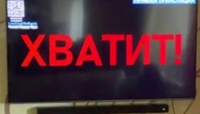 Hacked Russian TV channel shows Ukraine war footage instead of Moscow parade – photos