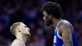 Joel Embiid given Flagrant 1 foul for grabbing Mitchell Robinson's leg, knocking him down