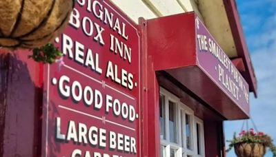 Inside the smallest pub on the planet - with space for just four drinkers