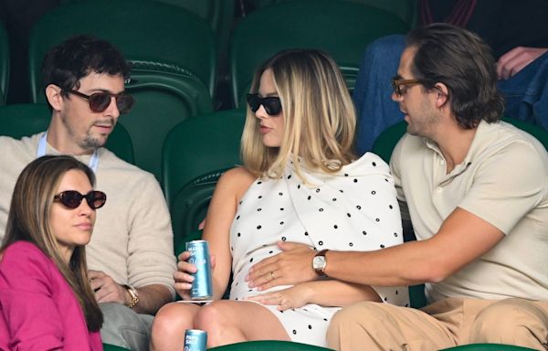 The Way Margot Robbie's Husband Touches Her Baby Bump Is A Sign Of 'Protection'