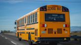 Driver of school bus carrying 17 kids passes out and plows through fence, WY cops say
