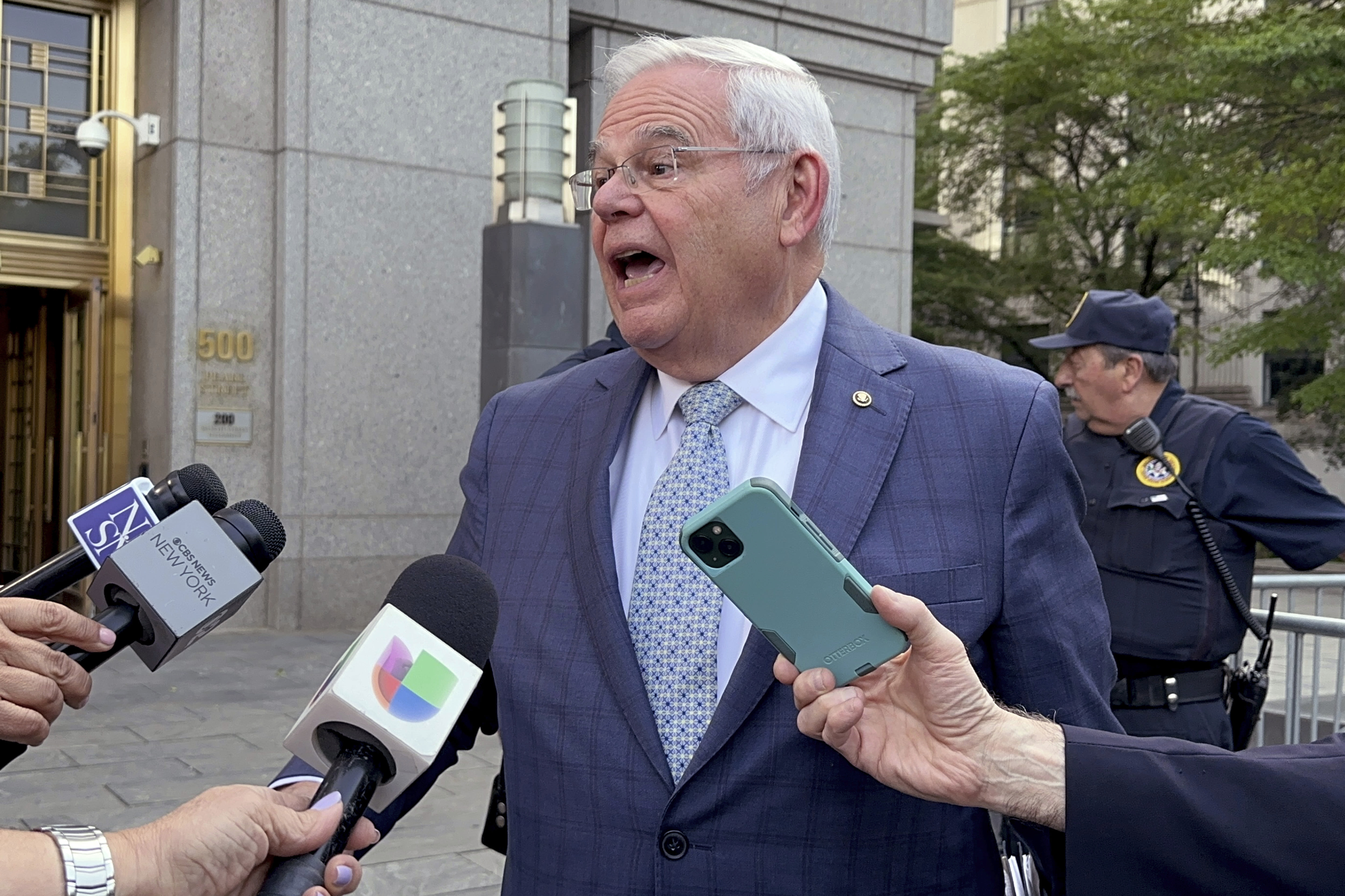 Menendez won't testify as he rests his bribery defense