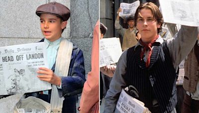 Seize the day! Christian Bale's son appears with him on 'The Bride' set dressed as a newsie