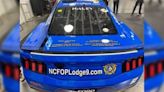 NASCAR team honors fallen officers with special paint scheme