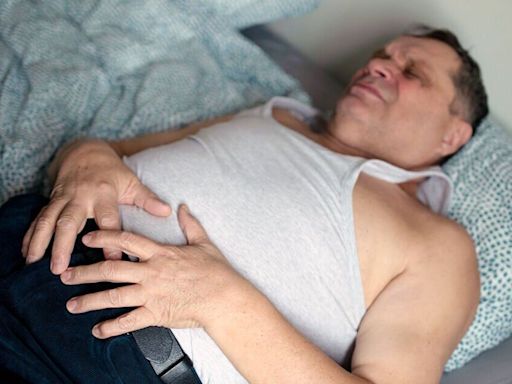 Red flag signs to spot as NHS warns when stomach pain could be a sign of cancer
