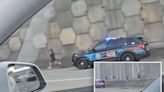 Hilarious video shows highway graffiti artists ditch buddy when police pull up