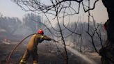 Heat Wave Sears London and Paris as Greece Battles Wildfires