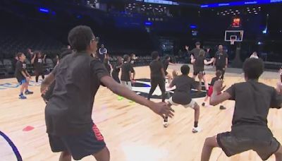 Brooklyn Nets surprise youth athletes with basketball camp scholarships