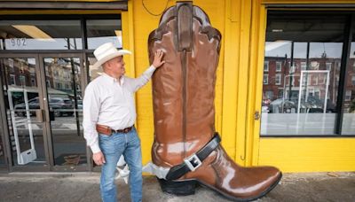 The tale of the 8-foot cowboy boot in the Italian Market and the store owner who put it there
