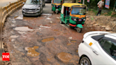 Gurgaon: How leakages in a pipeline leave this key city road riddled with potholes | Gurgaon News - Times of India