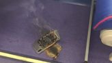 Passenger's smartphone catches fire as plane prepares to take off