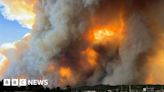 Thousands evacuated as dual fires surround New Mexico town