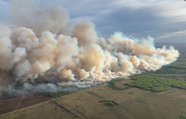Canada’s wildfire season re-erupts forcing thousands from homes