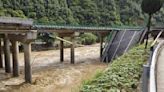 12 killed in China bridge collapse triggered by torrential rains, rescue work on