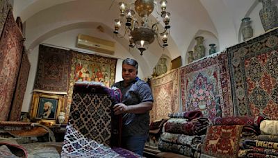 Sanctions and a hobbled economy pull the rug out from under Iran's traditional carpet weavers