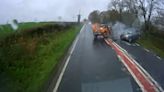 Moment driver smashes into oncoming car after overtaking lorry