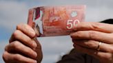 Canadian dollar seen up but gains restrained by mortgage resets