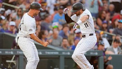 Cave's clutch 1st Rockies HR celebrated with ... silence