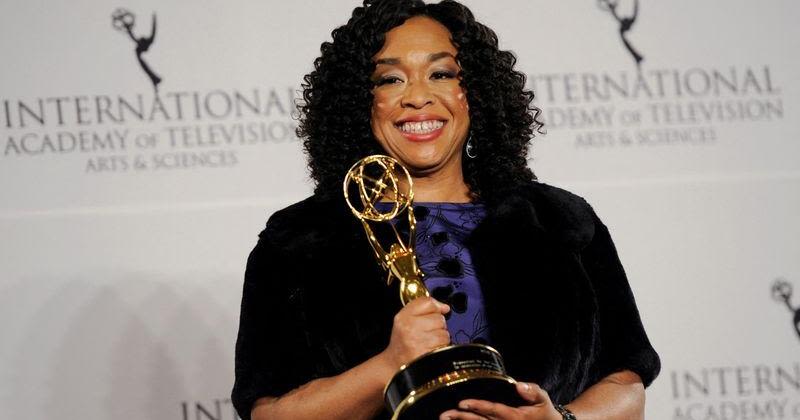 FILE PHOTO: Shonda Rhimes poses in the press room with the Founders Award International Emmy in Manhattan, New York
