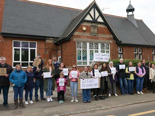 Protest-hit school ordered to improve amid 'turbulence in staffing'