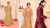 ...Merchant Wedding: Janhvi Kapoor stuns in a golden lehenga as she poses for paps while beau Shikhar Pahariya waits patiently | Hindi Movie News - Times of India