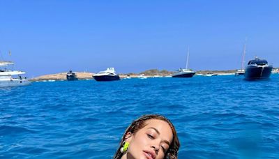 'Absolutely unreal' say Rita Ora fans as she poses in bright green bikini