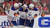 Diehard Oilers fans from Saskatoon cheer with their hearts, and statistics