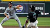 White Sox score tying run after intentional balk, beat Diamondbacks 9-2 for rare road win