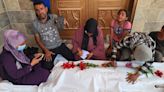 Searching for missing loved ones in Gaza’s mass graves