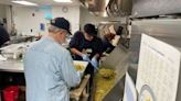 Volunteers team up at Light of Life Rescue Mission to serve thousands of meals on Thanksgiving